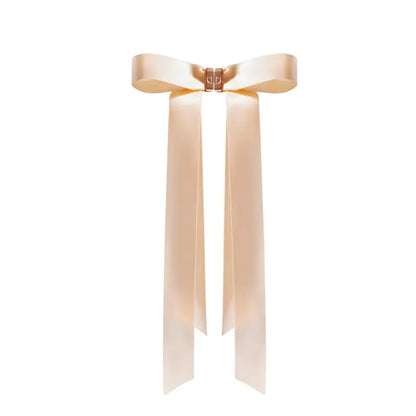 The Effortless Magnetic Bow: Chic Satin Hair Accessory for Instant Glamour